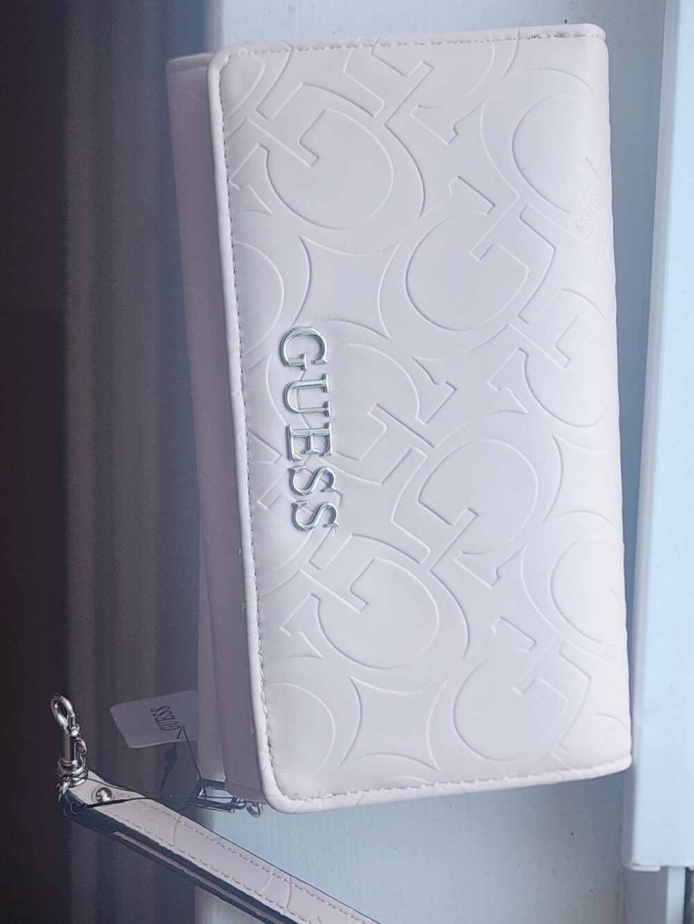 Guess Pale Pink Embossed Logo Wristlet with Silver Hardware - Picture 3 of 3